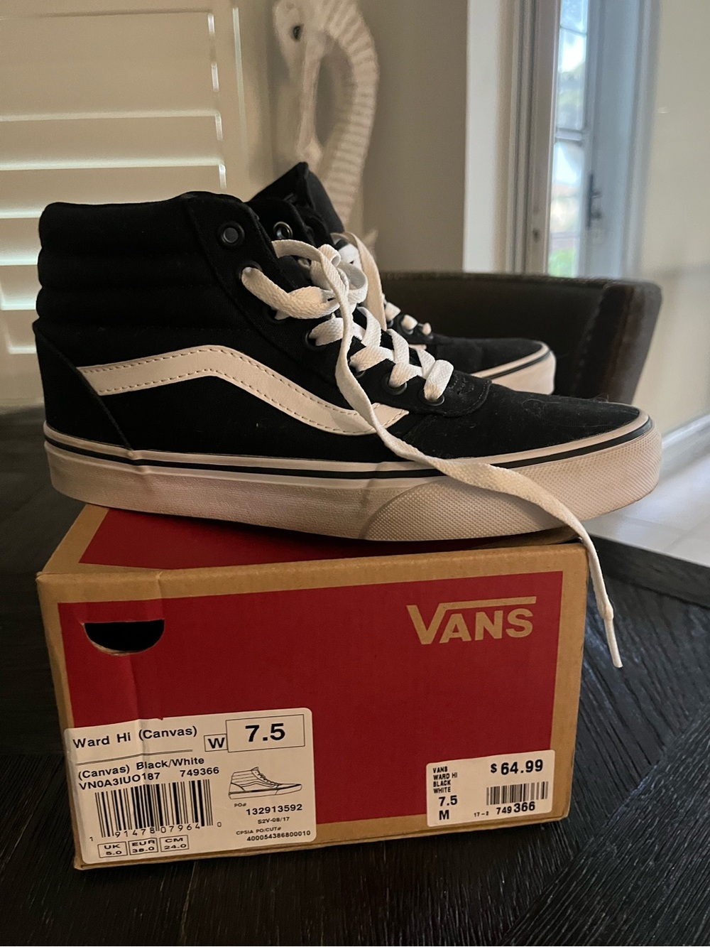Vans Black and White High-Top Skate Shoes